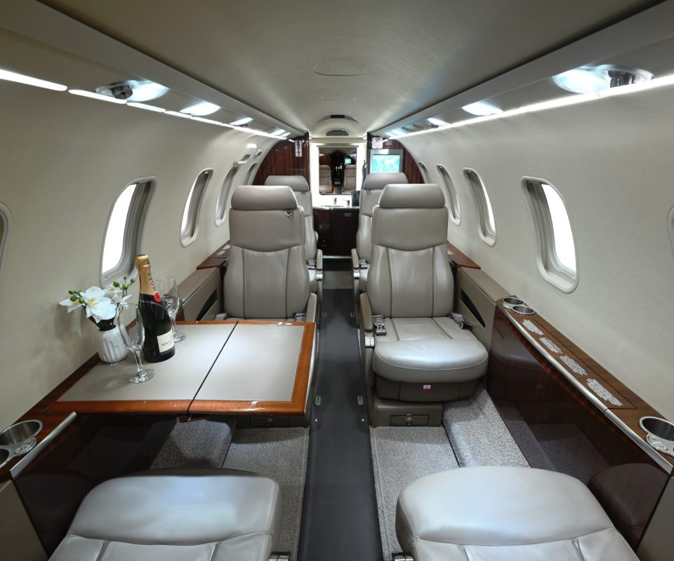 Lear 40XR main cabin with foldout tables